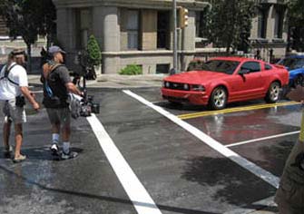 Crossing the street shooting Ford Mustang, 2006